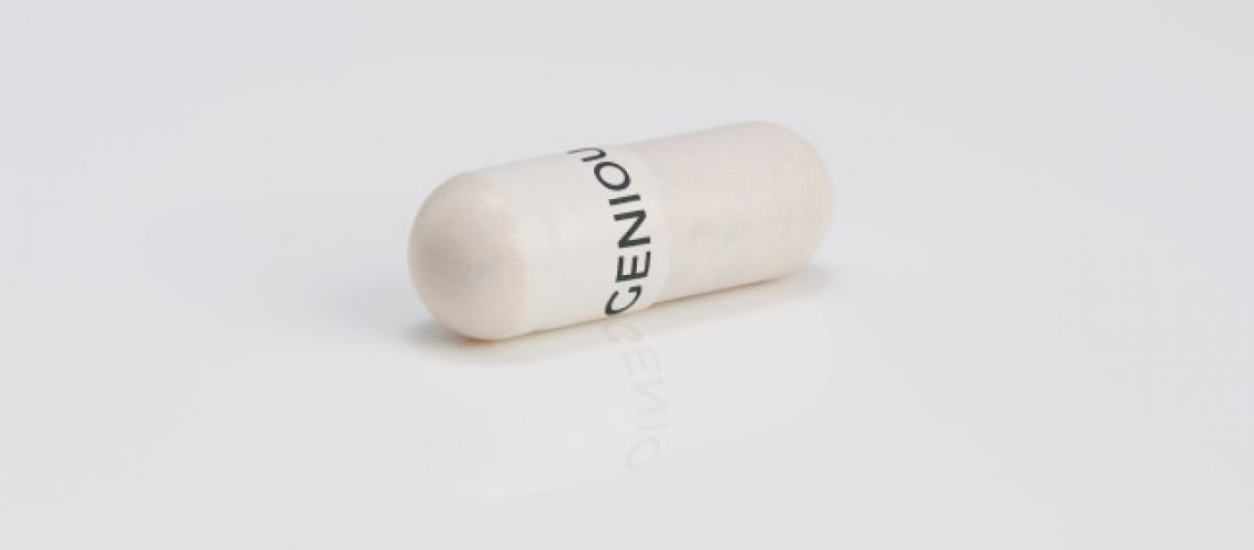 A white capsule with Ingenious written across it in black writing on a white background